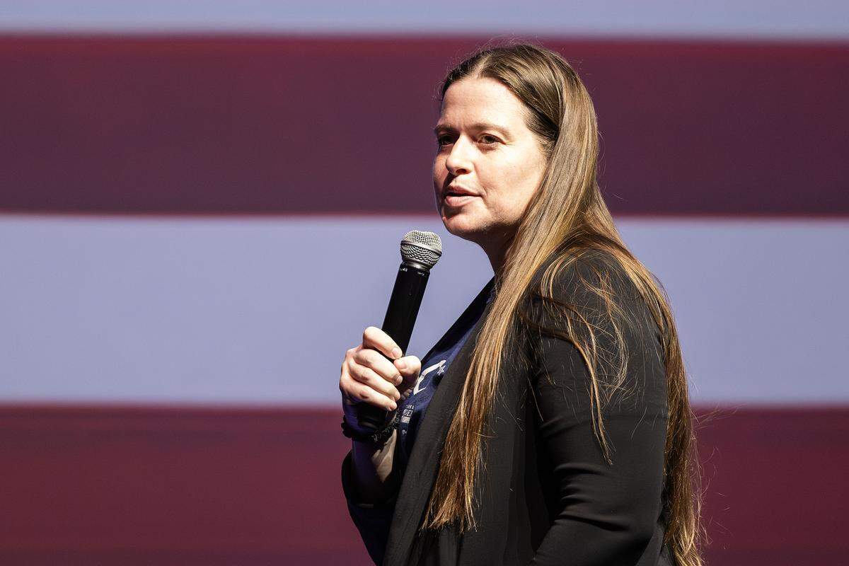 Allison Campolo, the Tarrant County Democratic Party chair, speaks to the capacity crowd gathered for ‘The People vs. The Power Grab’ rally at the Ridglea Theater in Fort Worth on Saturday, Aug. 9, 2025.
