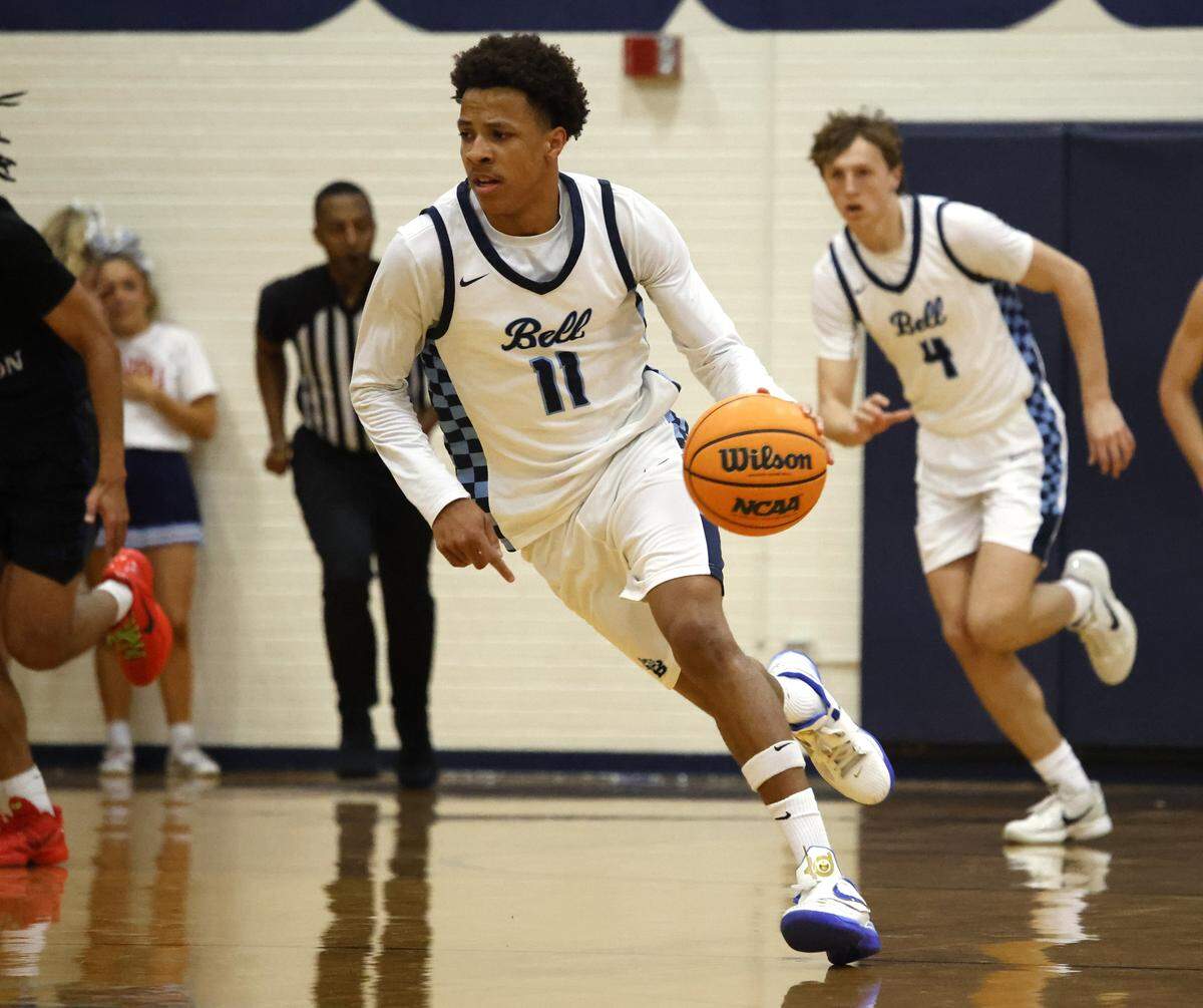 L.D. Bell guard Roman Washington (11) drives a defensive rebound down court against Byron Nelson during the first half of a boys UIL basketball game between Byron Nelson and L.D. Bell at L.D. Bell High School in Hurst, Texas, Friday Feb. 06, 2026