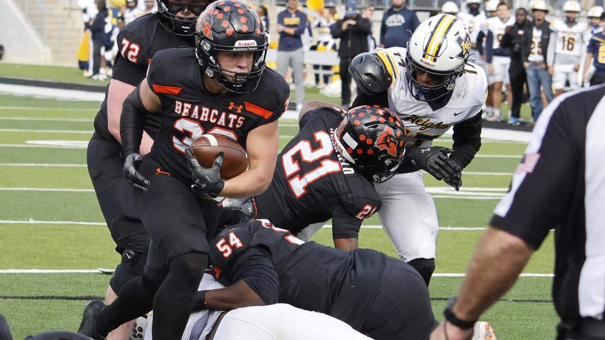 Aledo running back Brady Powell (39) goes in for six against Fort Worth Arlington Heights during the first half of a UIL Class 5A Division I Regional on Friday Nov. 28, 2025 at Crowley ISD Multi-Purpose Stadium in Fort Worth, Texas.