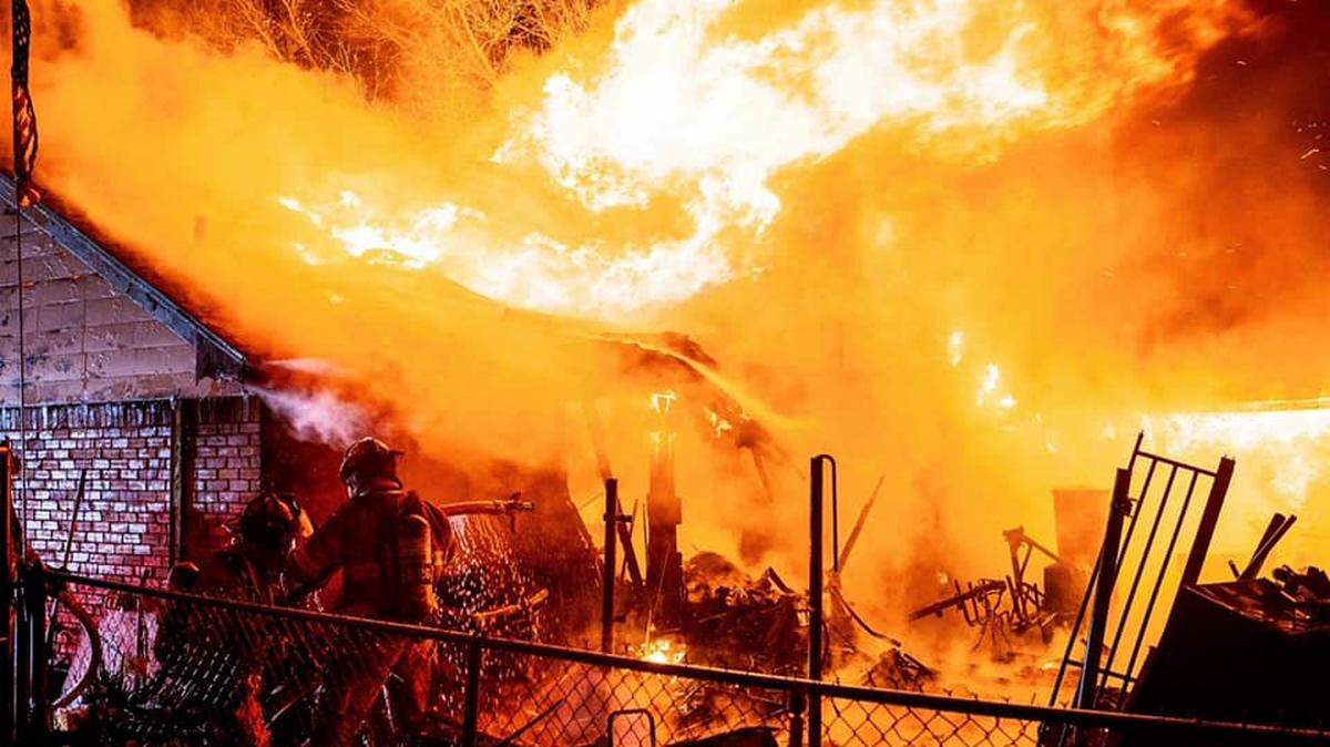 Fort Worth firefighters combat one of three residential fires and two apartment fires they responded to between Wednesday night and Thursday morning. DFW fire departments responded to around a dozen blazes in that time period.
