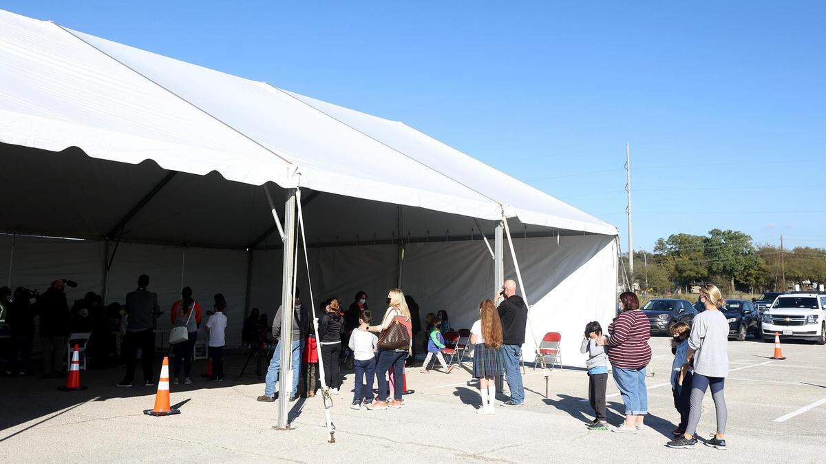 Parents and guardians wait for their children to receive the COVID vaccine in early November at the Wilkerson-Greines Activity Center.