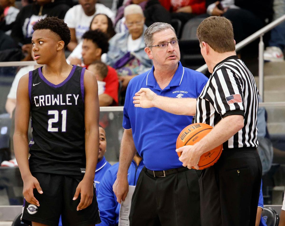North Crowley head coach Tommy Brakel gets a little heated with a call and an official during the fourth period of a UIL basketball game at North Crowley High School in Fort Worth, Texas, Tuesday, Feb. 13, 2024.