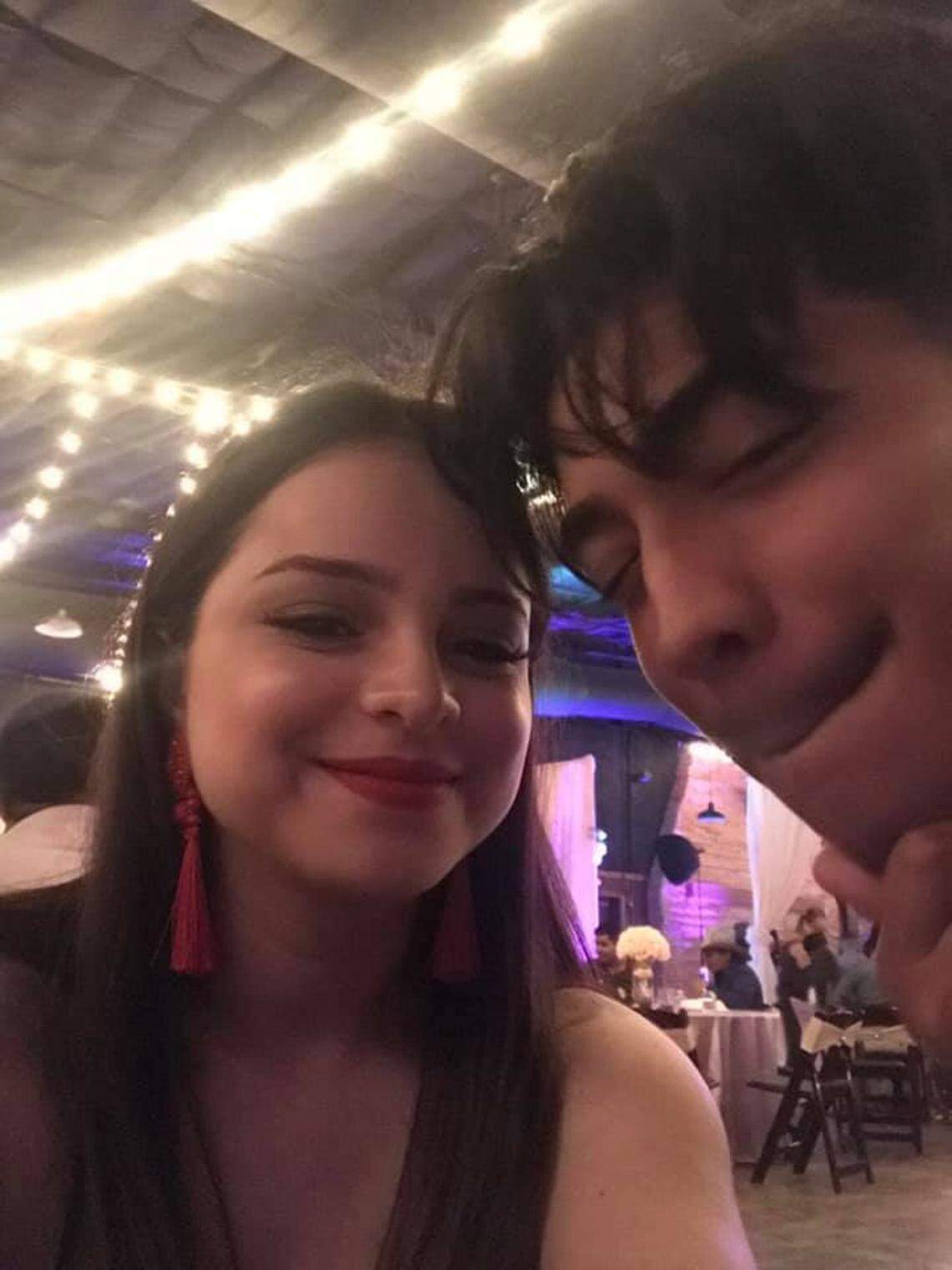 Pricila Garcia (left) poses for a photo with her cousin Andrew Elizondo. She and other relatives are still searching for answers after he was killed in a shooting at a house party early on Oct. 25 that resulted in another man dying and three people suffering injuries.