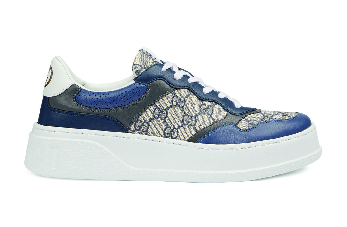 A picture of a blue and white Gucci sneaker featured at the Clearfork store location.
