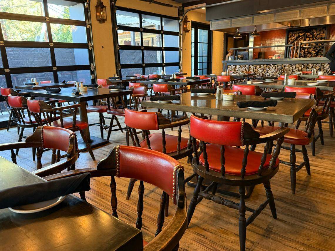 The new dining room at Cattlemen’s Fort Worth Steak House features large windows and a view of the future patio, still under construction in Fort Worth on Oct. 19, 2024.