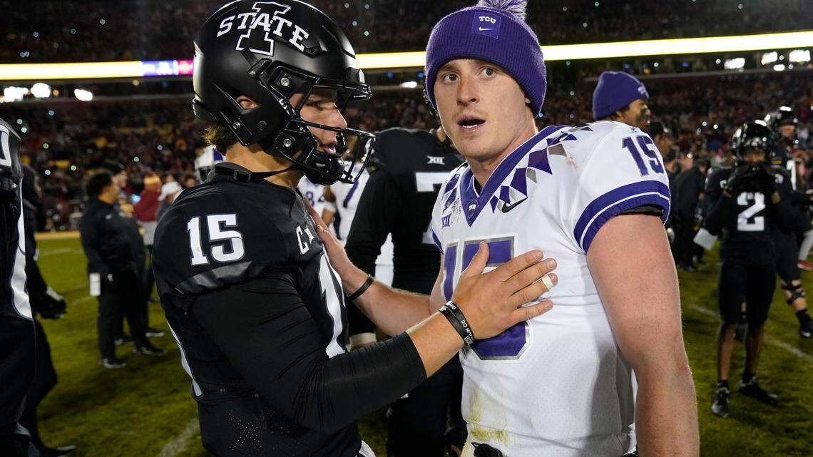 Iowa State quarterback Brock Purdy (15) talks with TCU quarterback Max Duggan (15) after their 2021 game. The Horned Frogs will be looking to snap a three-game losing streak against the Cyclones on Saturday.