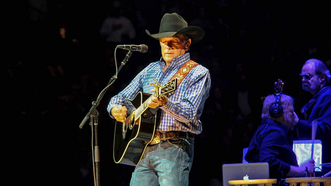 WATCH: Texas country music legend George Strait, Chris Stapleton play show in the rain