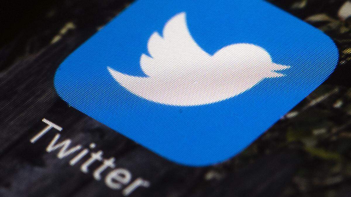 FILE - In this April 26, 2017, file photo is a Twitter app icon on a mobile phone in Philadelphia. (AP Photo/Matt Rourke, File)