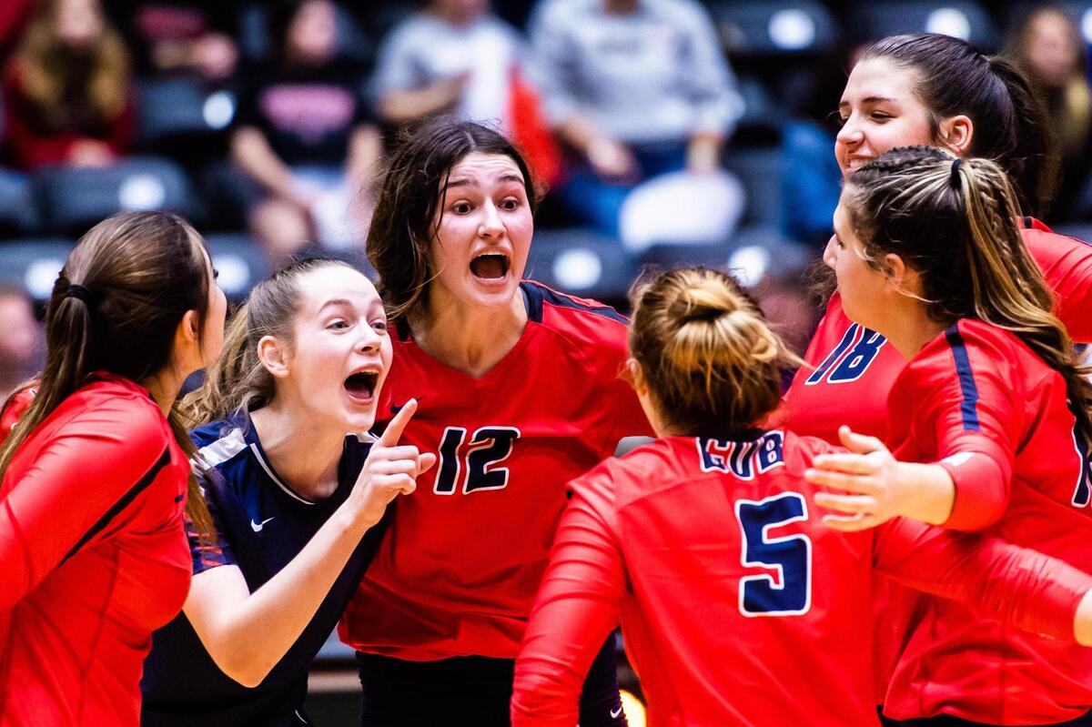 The Mustangs celebrate towards the end of set 4 during the 5A state semifinal game between Grapevine and Comal Canyon at the Curtis Culwell Center in Garland on November 19, 2021. Photo by Matt Smith. Special to the Star-Telegram.