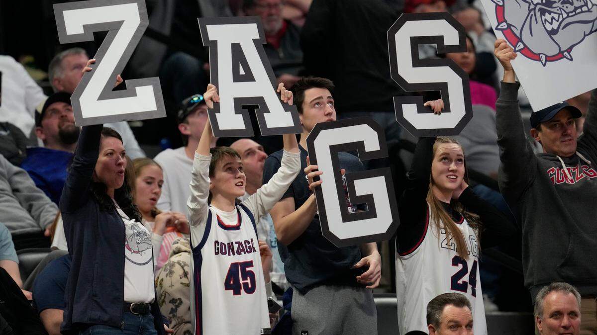 Gonzaga fans celebrate the Bulldogs’ win over TCU on Sunday in the NCAA tournament’s second round in Denver.
