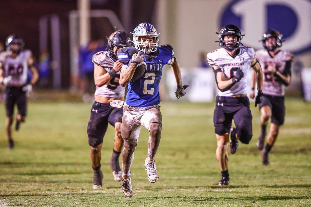 Decatur running back Jake Milligan scores on a 75-yard run against Springtown in the Friday, Nov. 1 game at Decatur. Special to the Star-Telegram / Tom Marvin