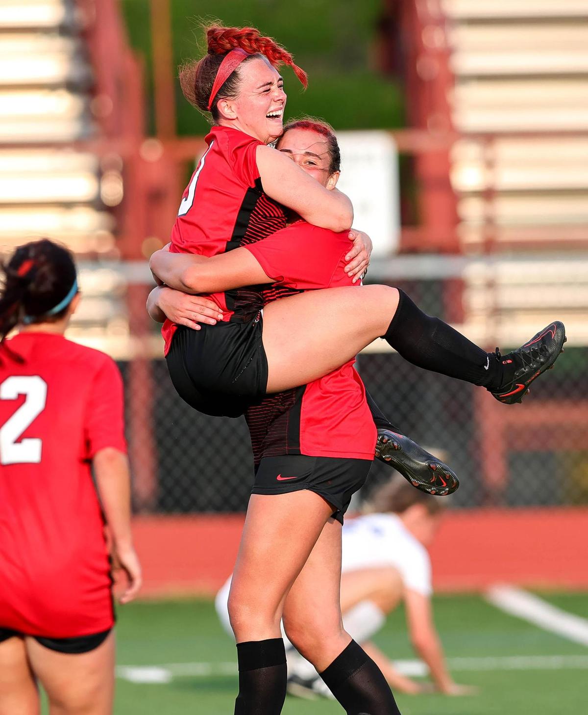 Burleson’s Kendall Carlock (R) and Maycie Massingill (L) celebrate after Carlock’s goal scored against Colleyville Heritage during the second half of the 5A Region 1 area round girls soccer playoffs played on March 30 2021, at Cravens Field in Arlington, TX. (Steve Nurenberg Special to the Star-Telegram)