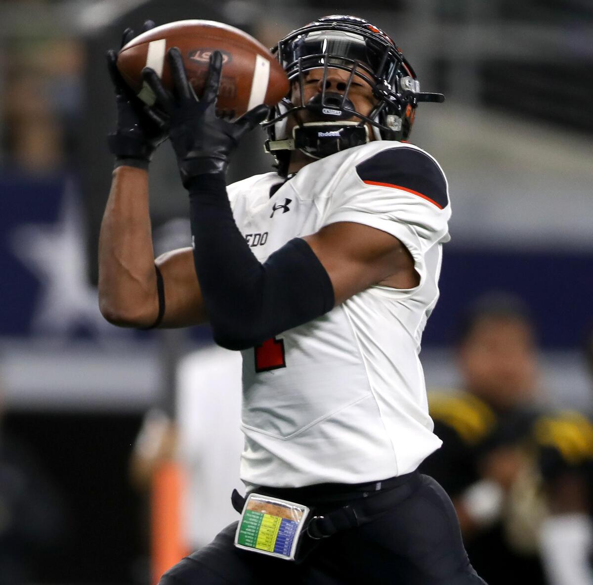 Aledo receiver JoJo Earle comes up with a 40-yard touchdown catch against Fort Bend Marshall in the first half of the 5A Division II high school football state championship game at AT&T Stadium in Arlington, Texas, Saturday, Dec. 21, 2019.