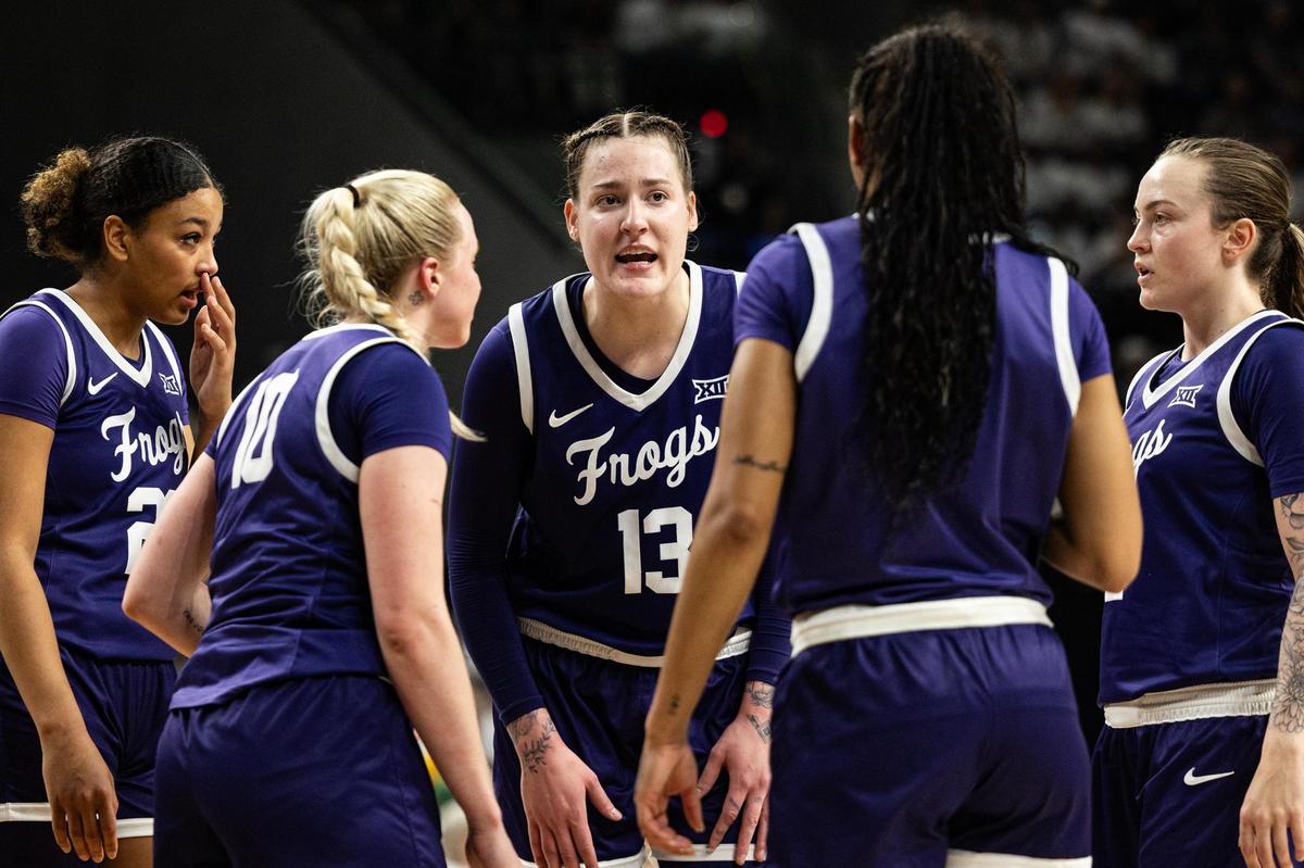 TCU center Sedona Prince (13) speaks with her team during a timeout against Baylor at Foster Pavilion in Waco on Sunday, March 2, 2025.