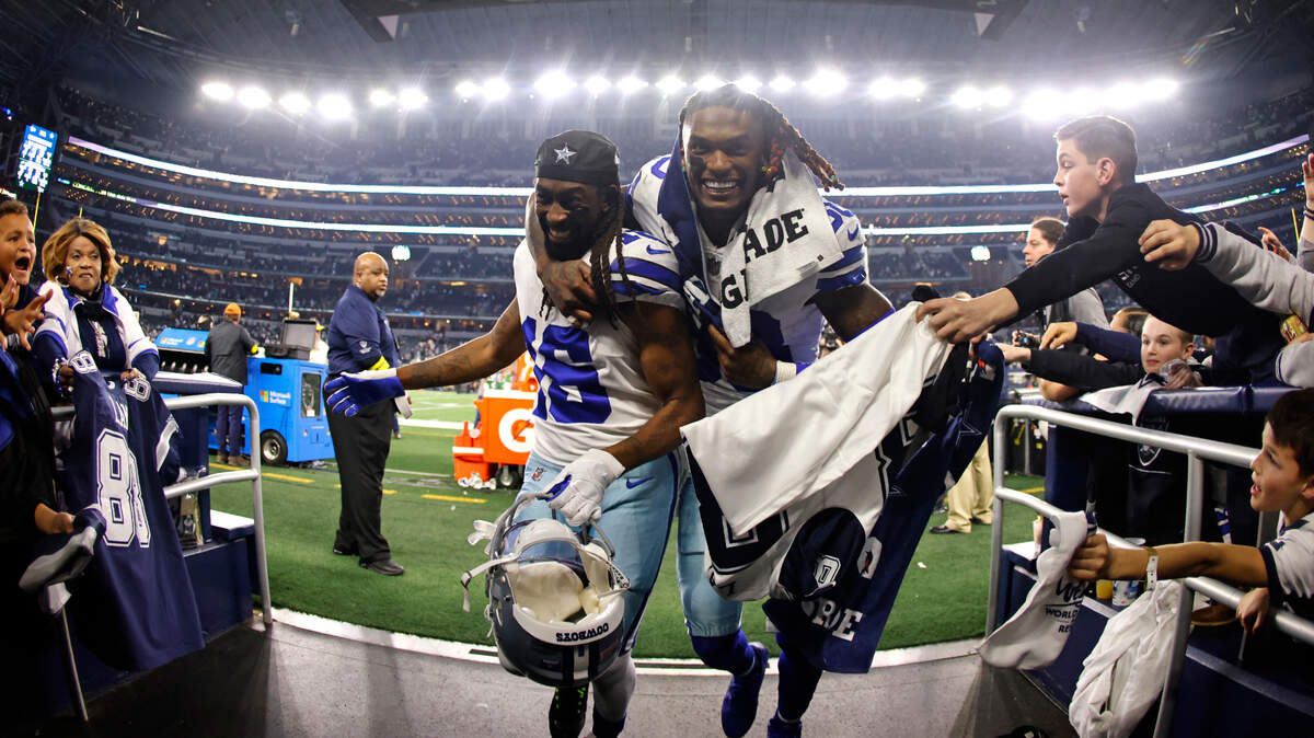 Dallas Cowboys’ T.Y. Hilton and CeeDee Lamb celebrate after an NFL football game against the Philadelphia Eagles Saturday, Dec. 24, 2022, in Arlington, Texas. The Cowboys won 40-34. (AP Photo/Ron Jenkins)