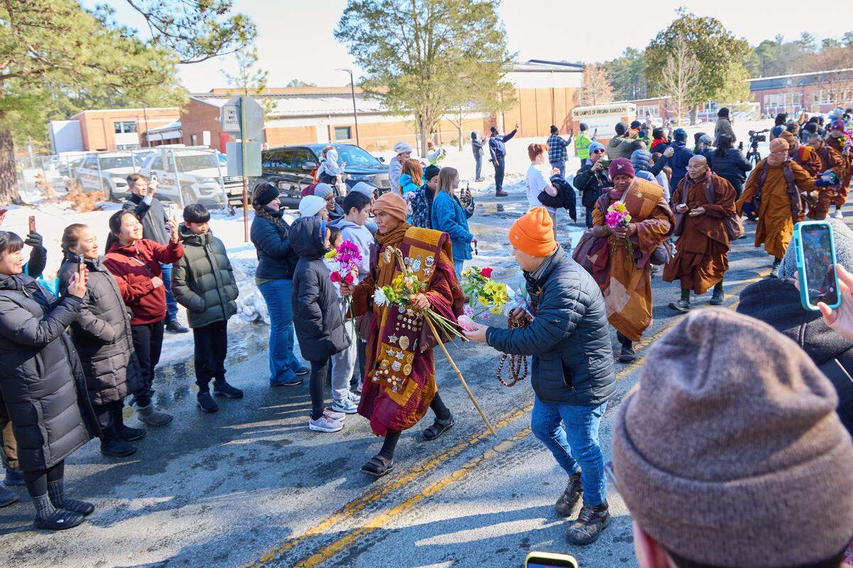 Led by Bhikkhu Pannakara, Buddhist monks participate in a Walk for Peace in Glen Allen, Virginia, on Feb. 3, 2026. The group walked from Fort Worth, Texas, to Washington, D.C. to promote peace, compassion and nonviolence.