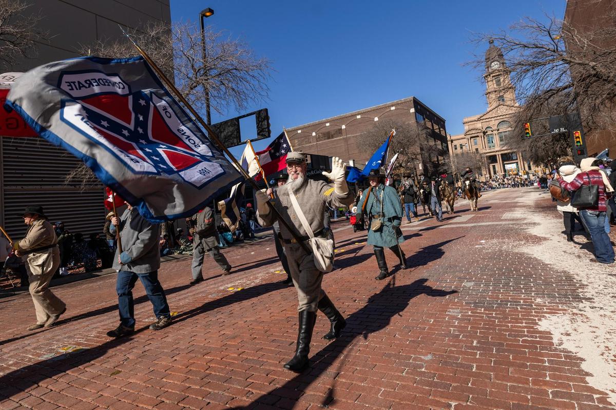 The Sons of Confederate Veterans make their way down Main Street for the Fort Worth Stock Show All Western Parade in downtown Fort Worth on Saturday, Jan. 18, 2025.