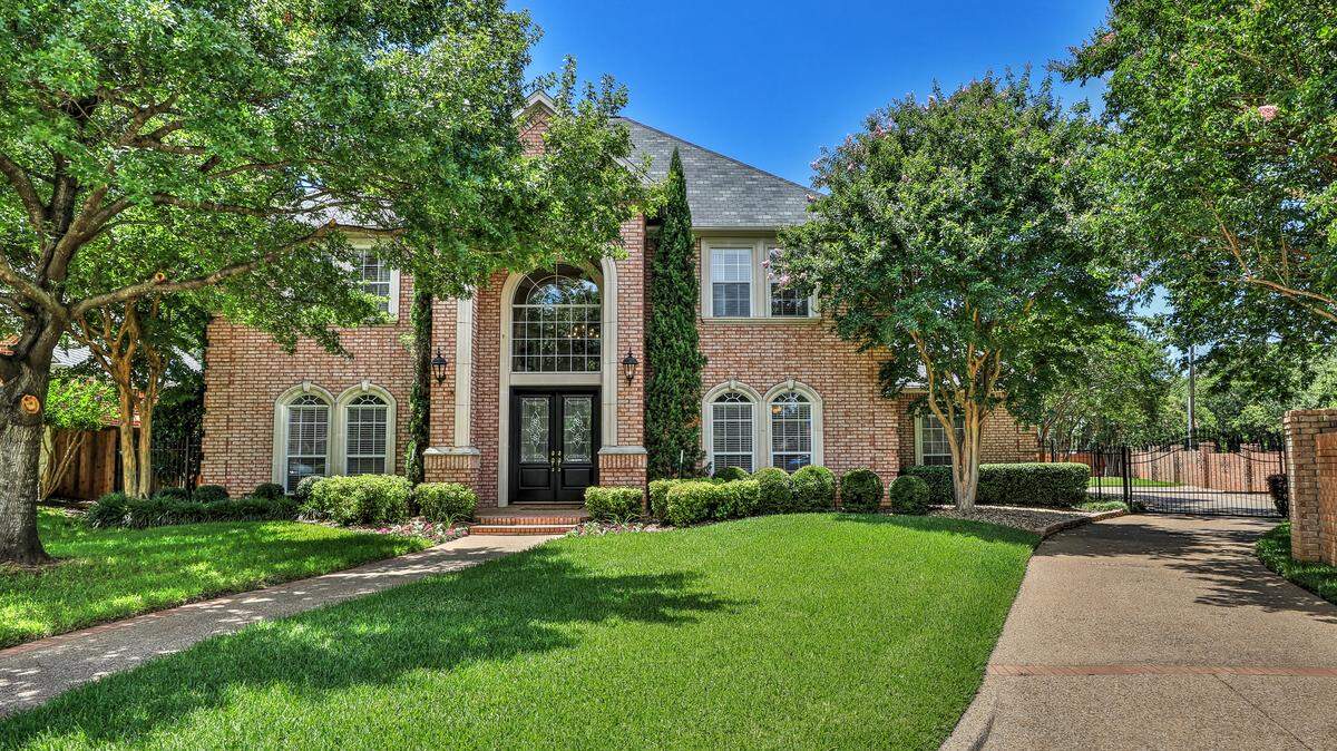 The home at 5800 Archbishop Court has great curb-appeal and plenty of shade from the trees.   