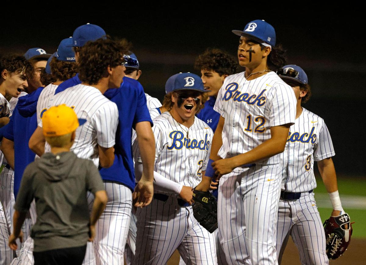 Players rush the field to celebrate with Brock pitcher Evan O’Connor (12) after he threw a complete game during a UIL Area Round 4A D2 baseball playoff game at Ranger Field in Saginaw, Texas, Friday, May 09, 2025.