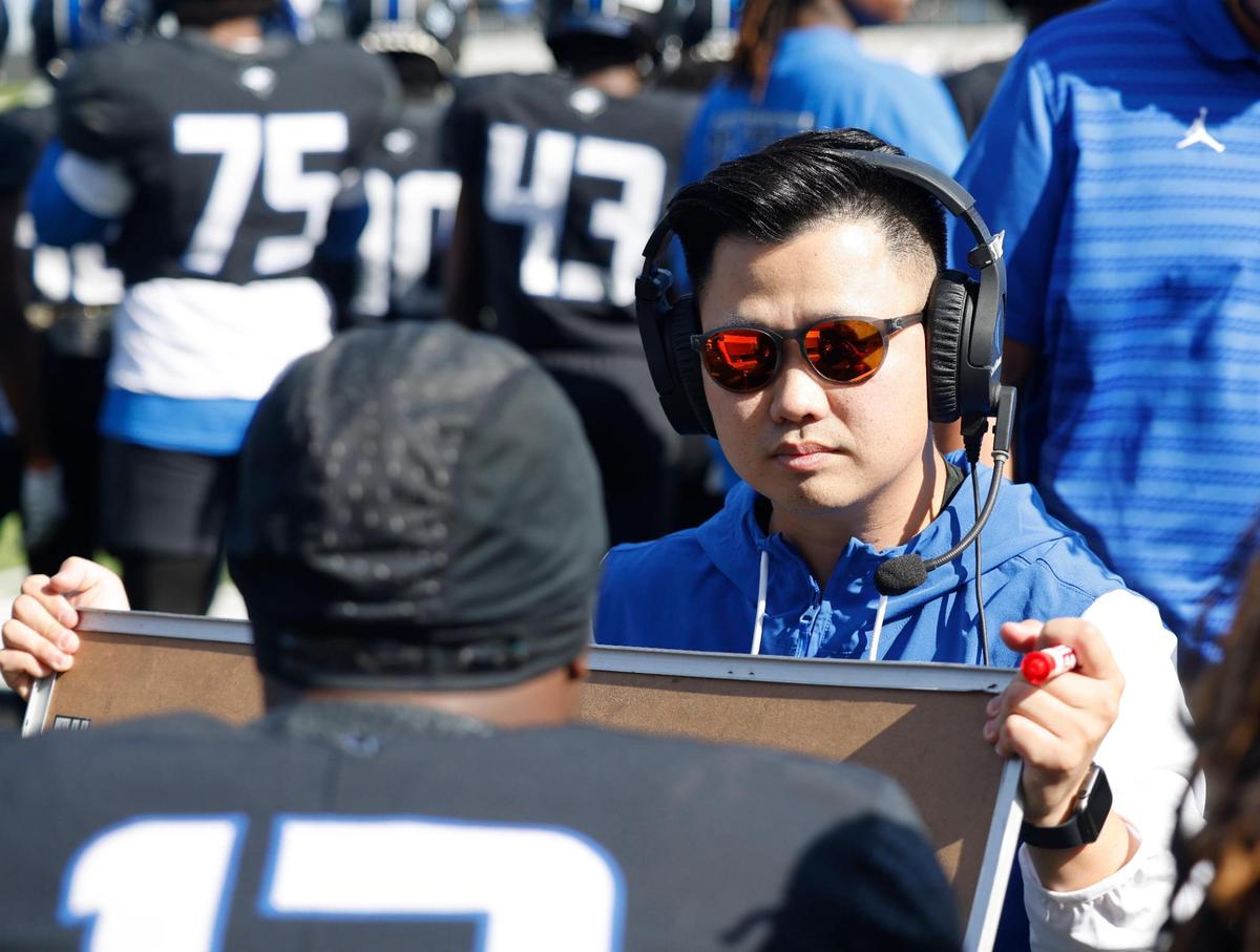North Crowley offensive coordinator Eli Reinhart talks with his squad during a UIL Class 6A D1 Bi-district playoff football game at Crowley ISD Multi-Purpose Stadium in Fort Worth, Texas, Saturday, Nov. 16, 2024.