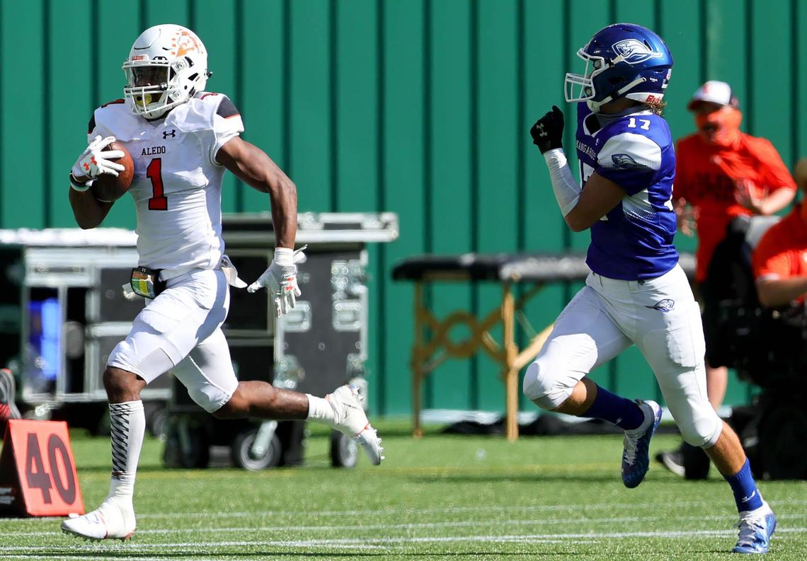 Aledo receiver Jo Jo Earle (1) beats Weatherford defensive back Gabe Alexander (17) for a touchdown during the first half, Saturday afternoon, Sepember 26, 2020 played at Globe Life Park in Arlington, TX (Steve Nurenberg Special to the Star-Telegram)