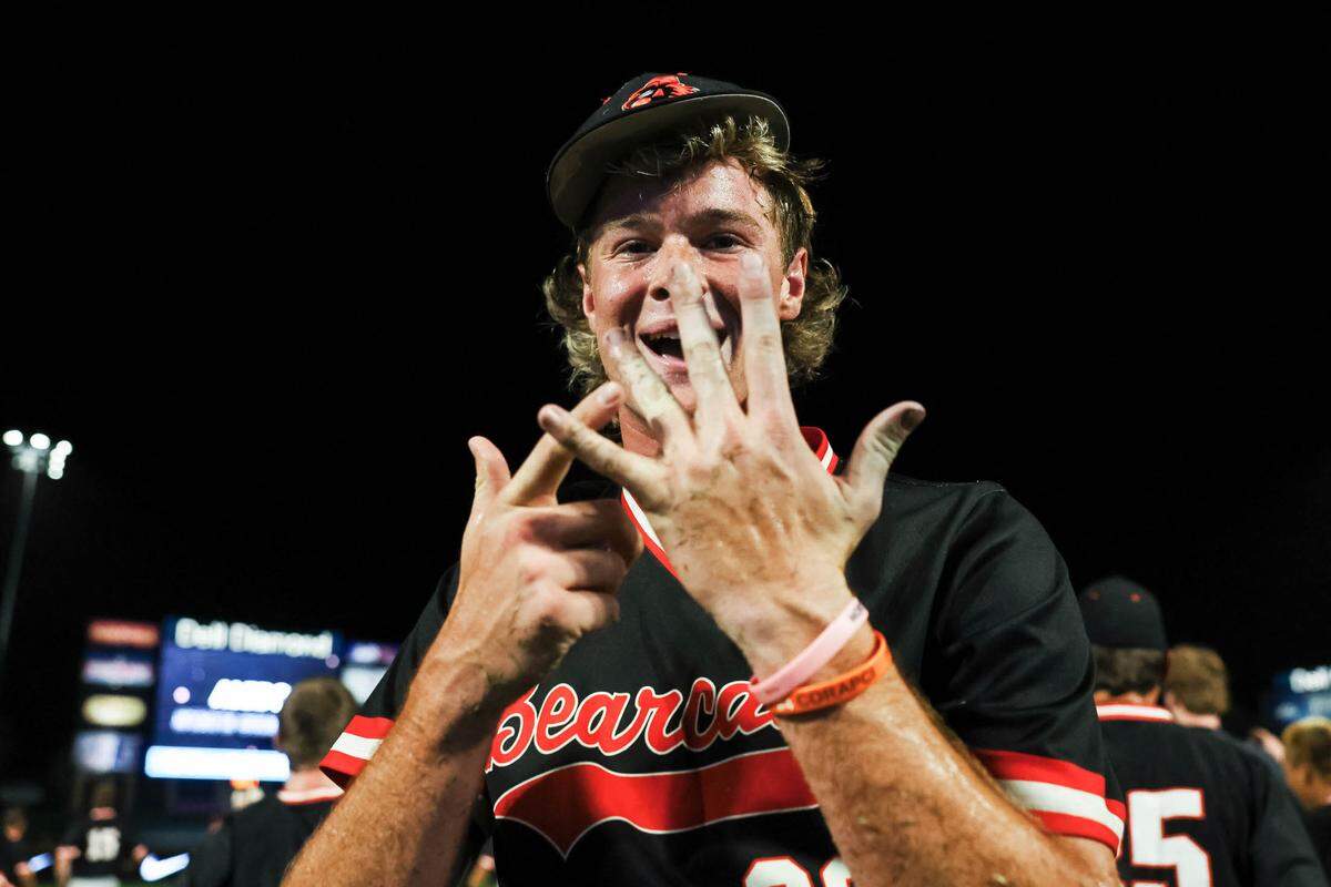 Aledo starting pitcher Devin Miller points to his ring finger after the Class 5A Division I playoffs state championship game at Dell Diamond Stadium on Friday, June 6, 2025.