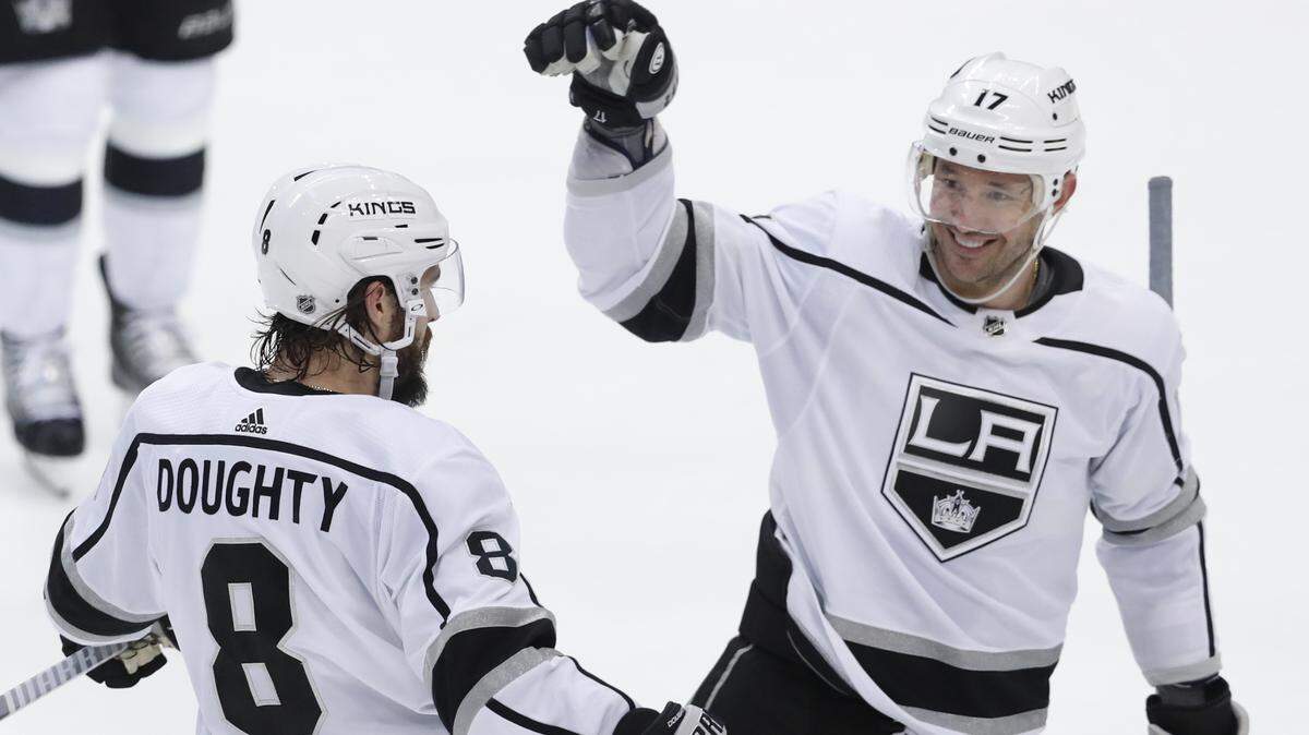 Los Angeles Kings defenseman Drew Doughty (8) celebrates his goal with teammate Ilya Kovalchuk (17) during the first period of an NHL hockey game against the Dallas Stars in Dallas, Thursday, Jan. 17, 2019. (AP Photo/LM Otero)