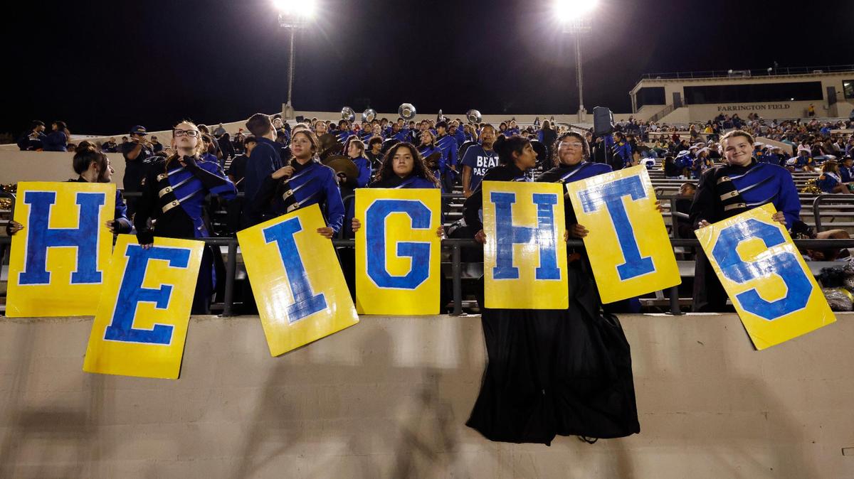 The Heights band shows some spirit during the Battle of the Bonfire UIL District 4-5A D1 football game at Farrington Field in Fort Worth, Texas, Friday, Nov. 08, 2024.