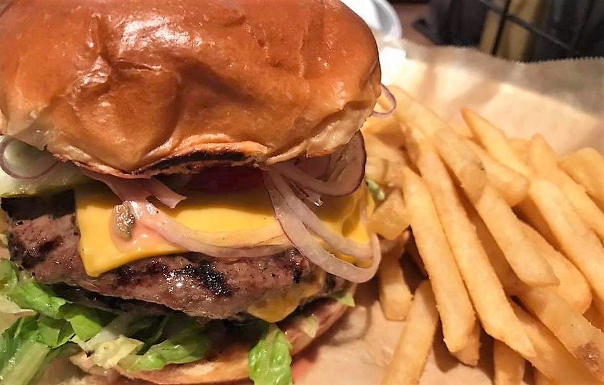 The All-American Burger at Lazy Dog Restaurant & Bar, which opened an Arlington in October. A Euless location of the dog-friendly California-based chain opened in early 2017.