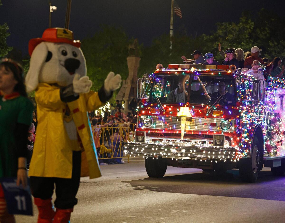 Sparky the Fire Dog leads one of Benbrook’s engines during the 2024 Parade of Lights.