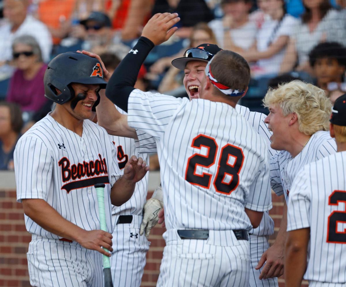Team mates welcome Aledo third baseman Blake Burdine (6) back to the dugout after scoring during a UIL 5A D1 semifinal baseball game at Dallas Baptist University’s Horner Ballpark in Dallas, Texas, Thursday, May 29, 2025.