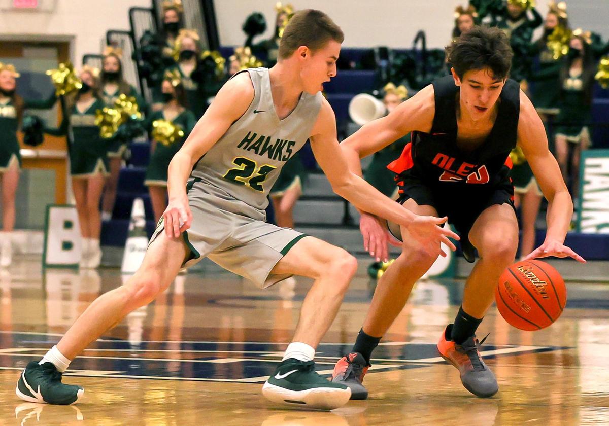 Birdville guard Chase Henderson (22) tries for a steal against Aledo guard Daniel Sohn (R) during the first half of a 5A Bi-district Boys High School Basketball game played at Richland High School, February 20, 2021 in North Richland Hills, Tx. (Steve Nurenberg Special to the Star-Telegram)
