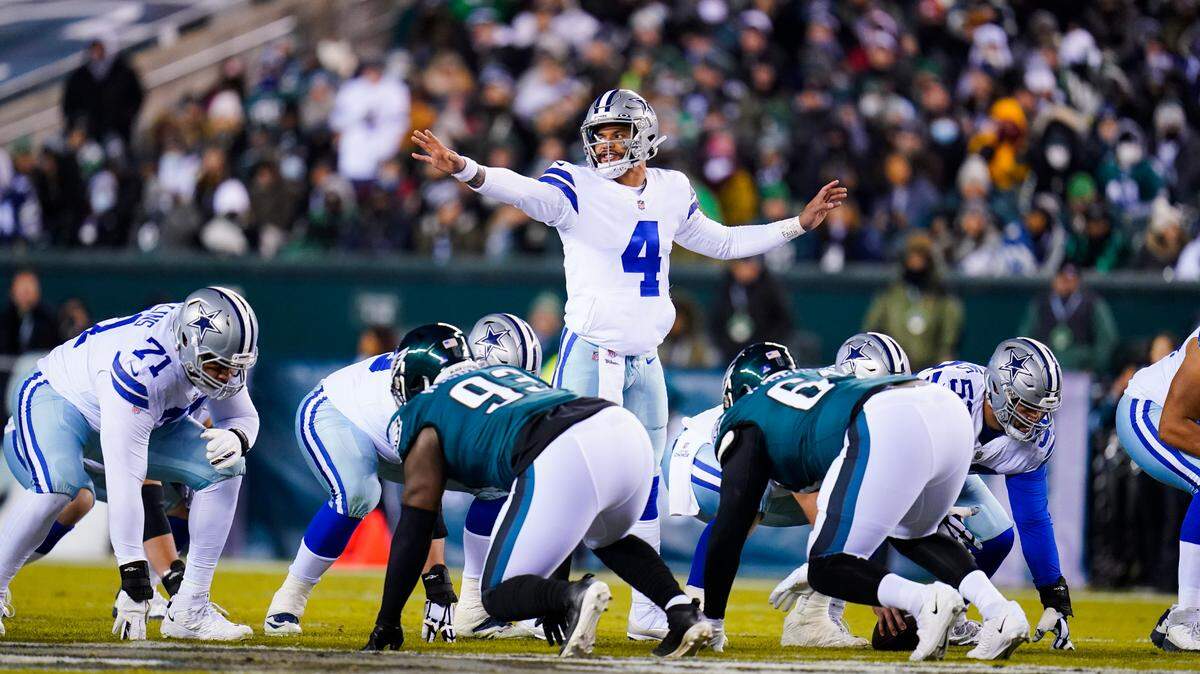Dallas Cowboys quarterback Dak Prescott threw two touchdown passes in the first half Saturday to help set a franchise record for points in a season. The Cowboys led the Philadelphia Eagles 30-17 at halftime.
