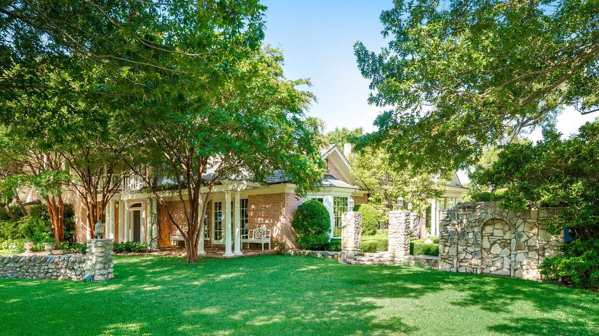 The home at 900 Alta Drive is priced $5,495,000.