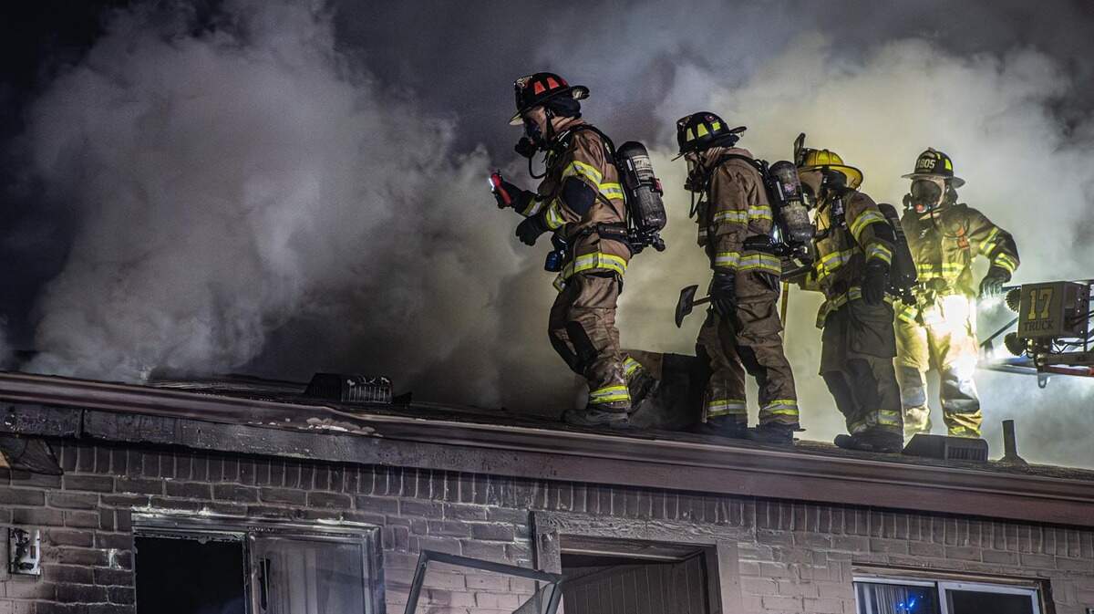 Fort Worth firefighters battled a blaze at a two-story apartment complex near downtown early Saturday, Dec. 20. Nearly a dozen people, including some children, were displaced by the fire.