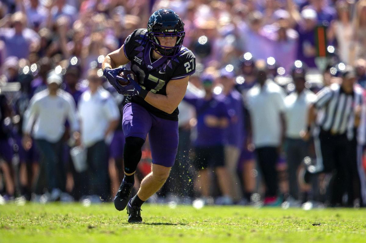 TCU wide receiver Gunnar Henderson drives the ball down the field during their game against OU at the Amon G. Carter Stadium in Fort Worth, Texas, on Saturday, Oct. 1, 2022.