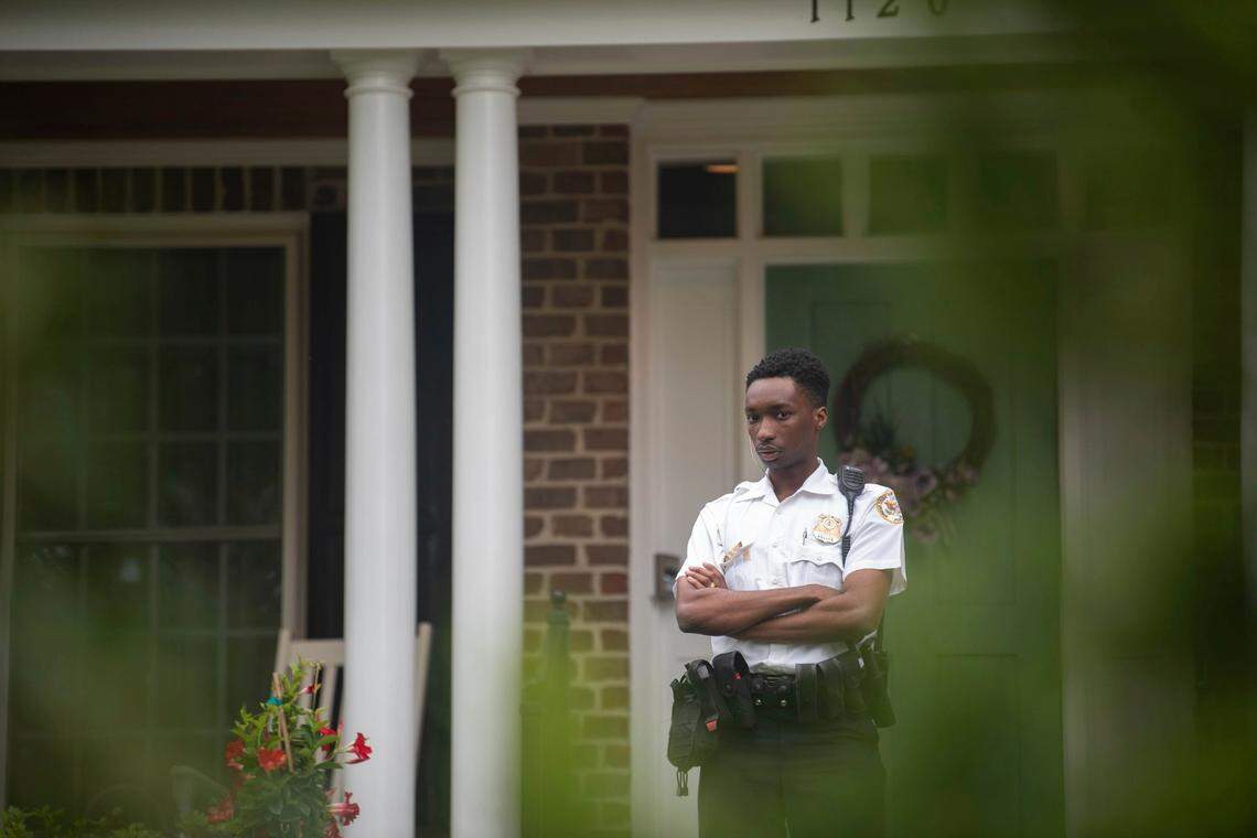 A U.S. Supreme Court police officer stands outside the home of Justice Samuel Alito on Thursday, May 5, 2022, in Alexandria, Va. A draft opinion suggests the U.S. Supreme Court could be poised to overturn the landmark 1973 Roe v. Wade case that legalized abortion nationwide, according to a Politico report released Monday. Whatever the outcome, the Politico report represents an extremely rare breach of the court’s secretive deliberation process, and on a case of surpassing importance. (AP Photo/Kevin Wolf)