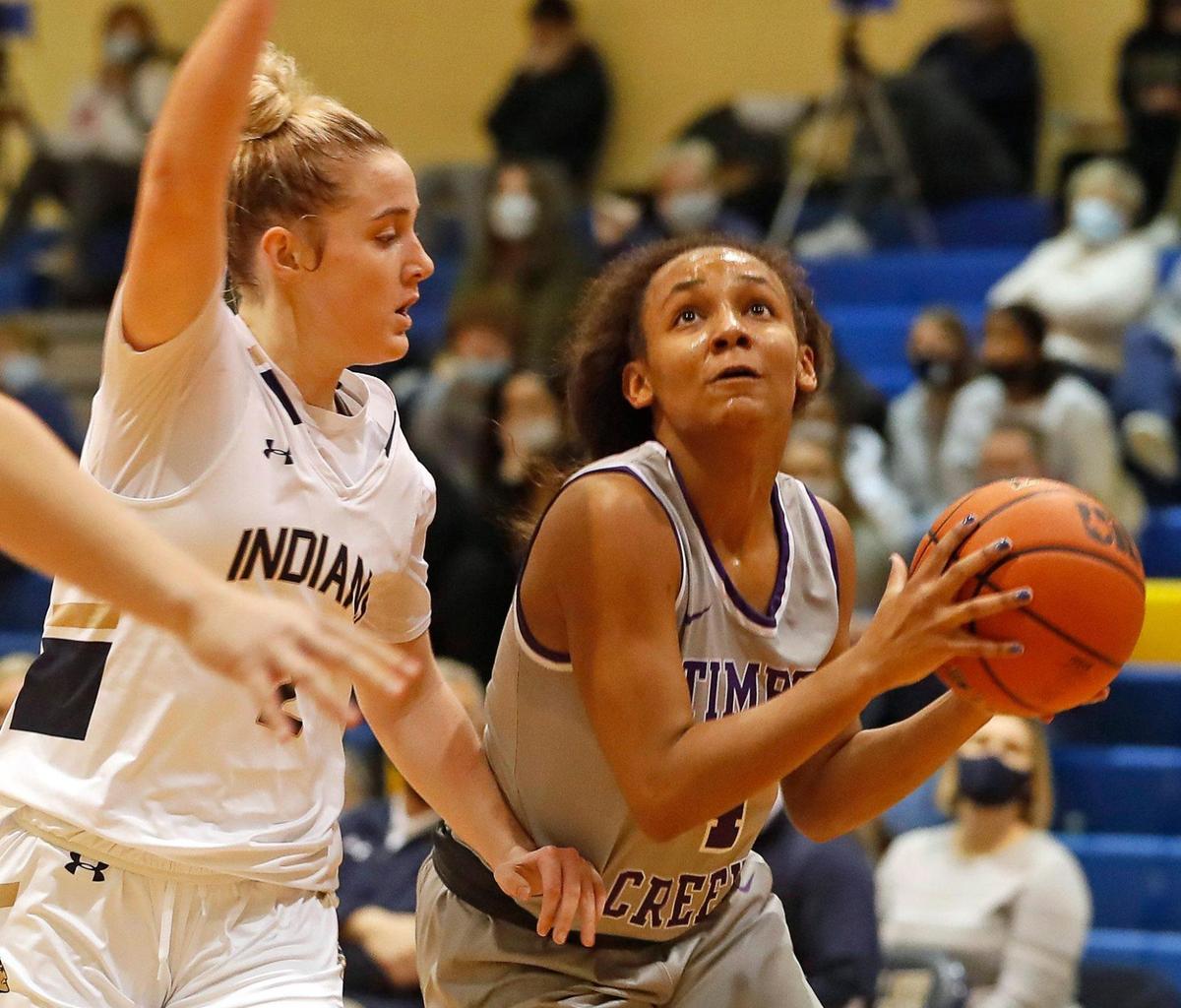 Timber Creek guard Mia Topping (4) gets a look defended by Keller guard Cambridge Mathews (2) in the first half of a 4-6A district high school girls basketball game at Keller High School in Keller, Texas, Thursday, Jan. 28, 2021. Timber Creek led 28-27 at the half. (Special to the Star-Telegram Bob Booth)