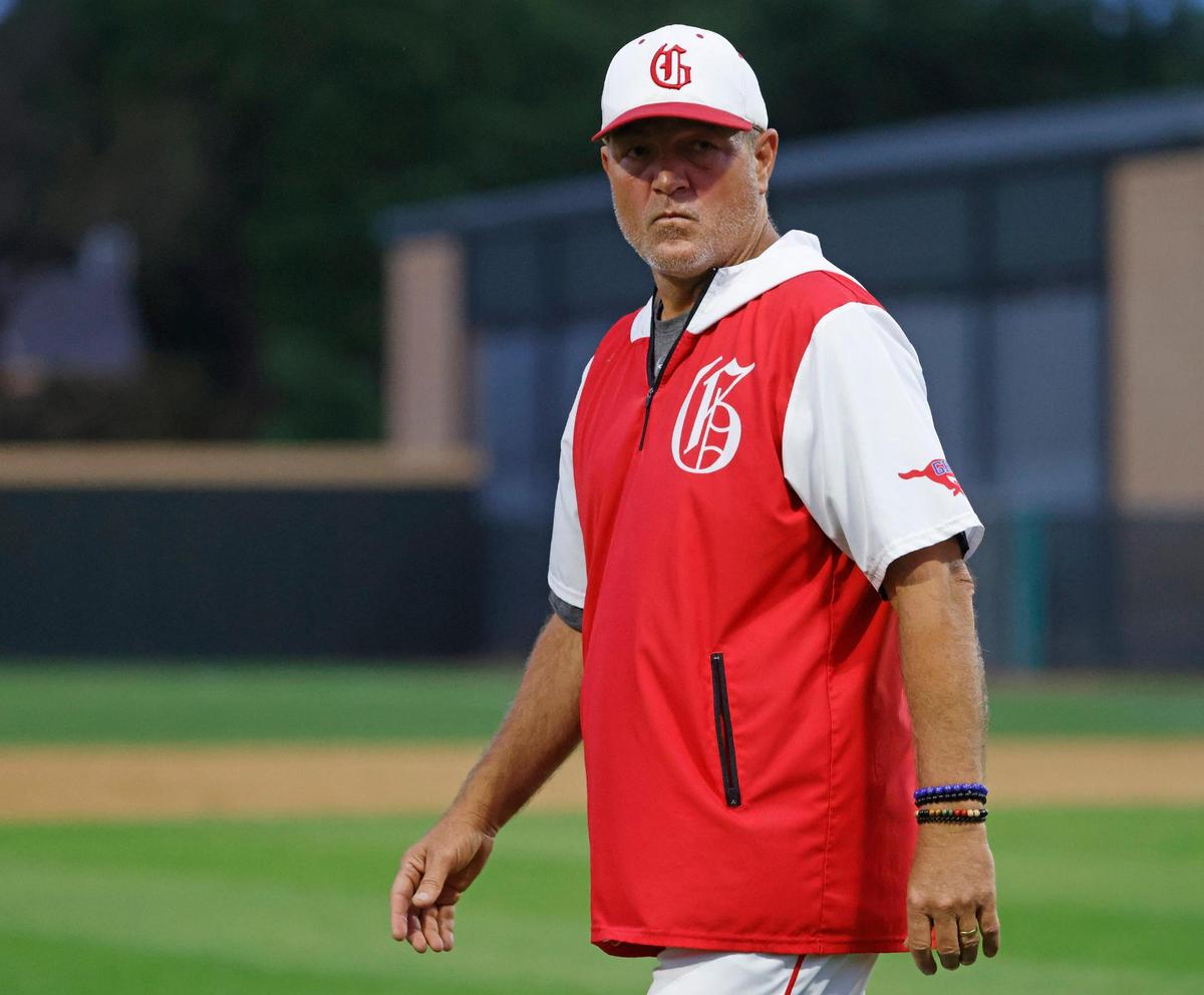 Grapevine head coach Jimmy Webster glances to the dugout during a UIL baseball game at Grapevine Mustang Field in Grapevine, Texas, Thursday, Apr. 17, 2025.