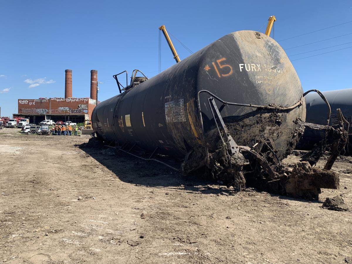 This tanker car was damaged by a derailment but didn’t leak or catch fire. It is one of the newer model DOT-117 tankers, which are designed to protect flammable cargo in a crash.
