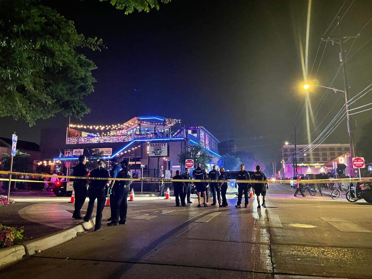 Two people were shot when a gunman opened fire into a crowd at Varsity Tavern in the West 7th district of Fort Worth early Sunday morning, according to Fort Worth police.