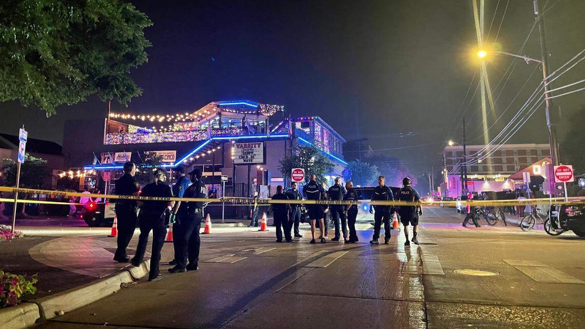 Two people were shot when a gunman opened fire into a crowd outside Varsity Tavern in the West 7th district of Fort Worth in May. The city voted unanimously Tuesday to ban open alcohol containers on streets in the district in an effort to reduce crime in the area.