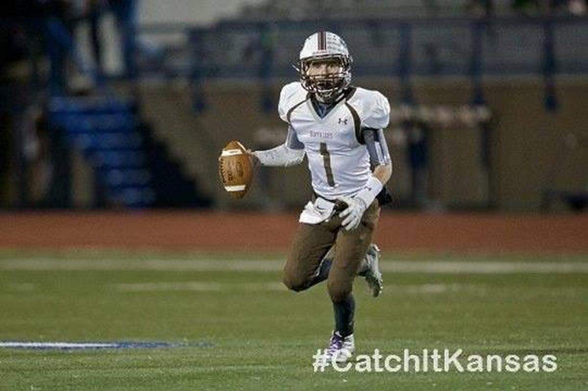 Keller Central assistant coach Derek Hill, shown when he played quarterback at Garden City High School in Kansas, has battled cystic fibrosis his entire life.