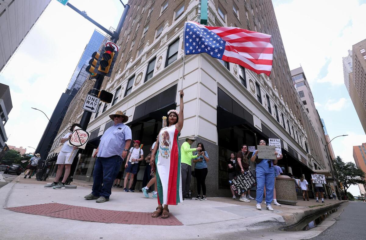 Community members rally during the “No Kings Day” protest in downtown Fort Worth on June 14, 2025.