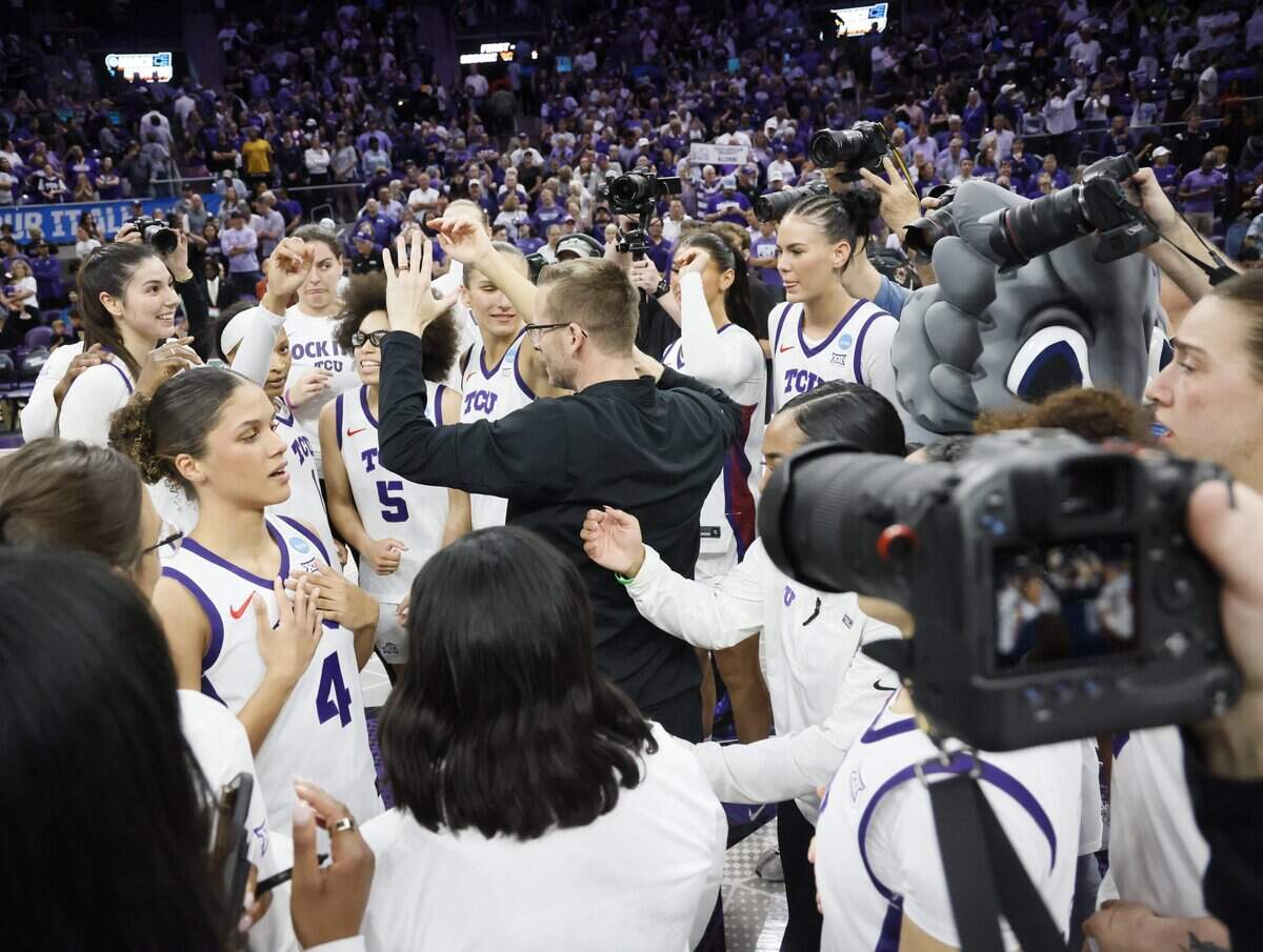 TCU head coach Mark Campbell talks to the team about moving on to the Sweet 16 after defeating Washington in a second round NCAA Division I Women's Basketball Championship game at Schollmeier Arena in Fort Worth, Texas, Sunday, March, 22, 2026.