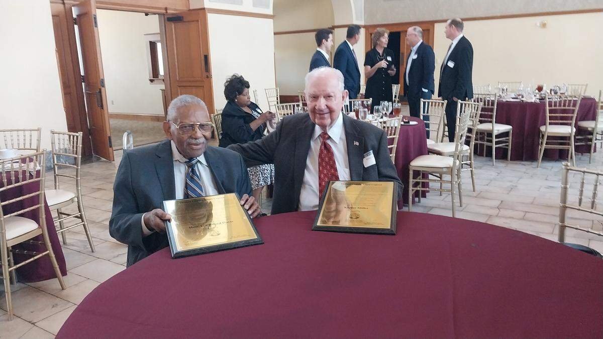 Judge L. Clifford Davis (left) and Kleber Miller were honored at a Tarrant County Bar Association luncheon on Oct. 15 as the county’s first Legal Legends. Both men celebrated their 100th birthday earlier this year.