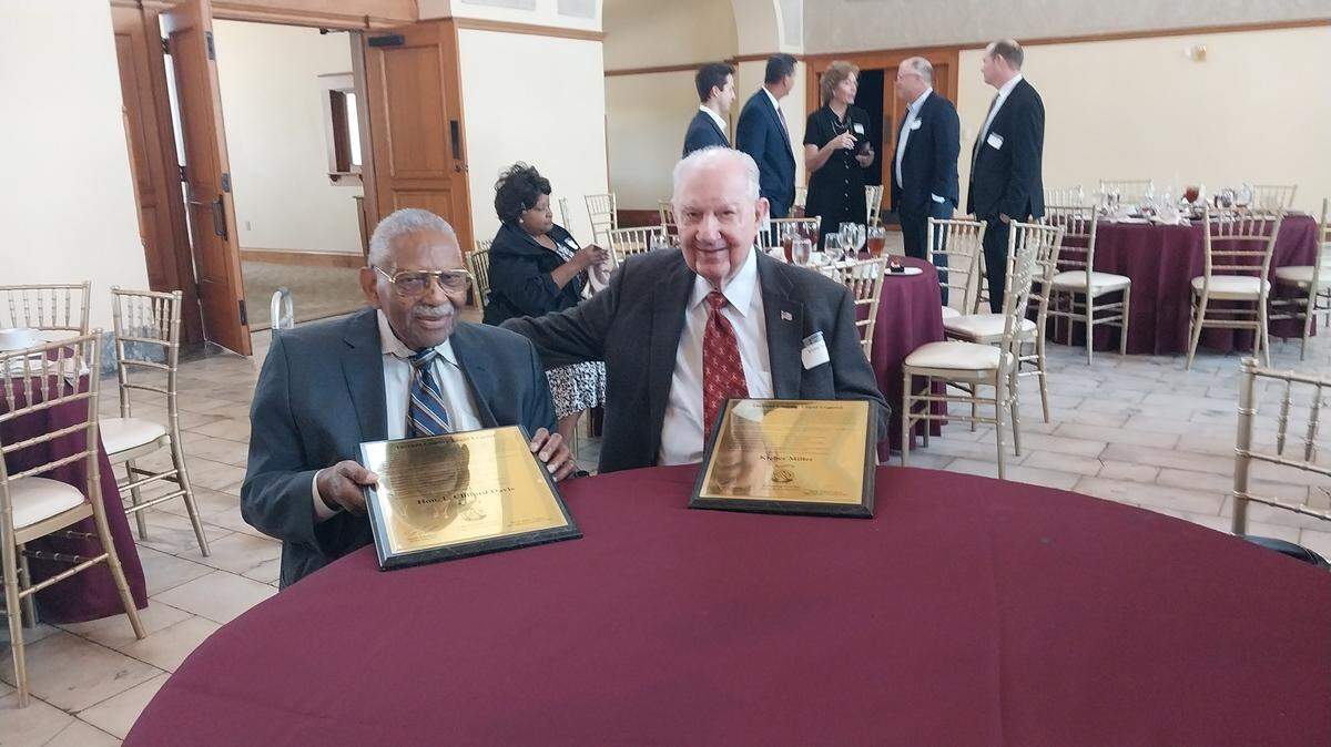Judge L. Clifford Davis (left) and Kleber Miller were honored at a Tarrant County Bar Association luncheon on Oct. 15 as the county’s first Legal Legends. Both men celebrated their 100th birthday earlier this year.