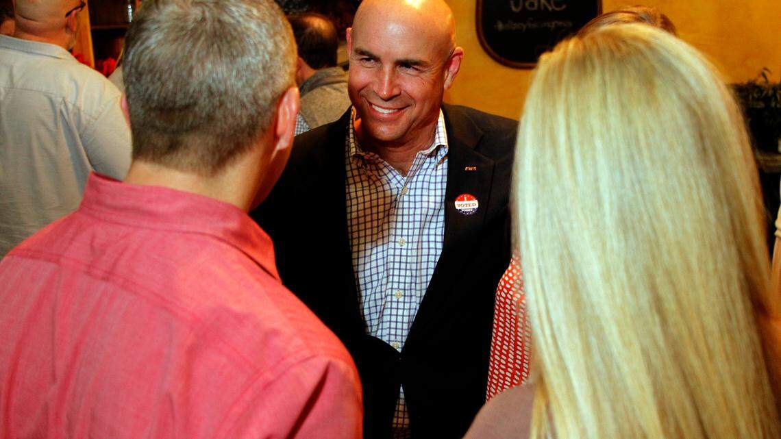 U.S. House candidate Jake Ellzey visits with supporters during his election party in May. He defeated Susan Wright in a runoff on Tuesday.