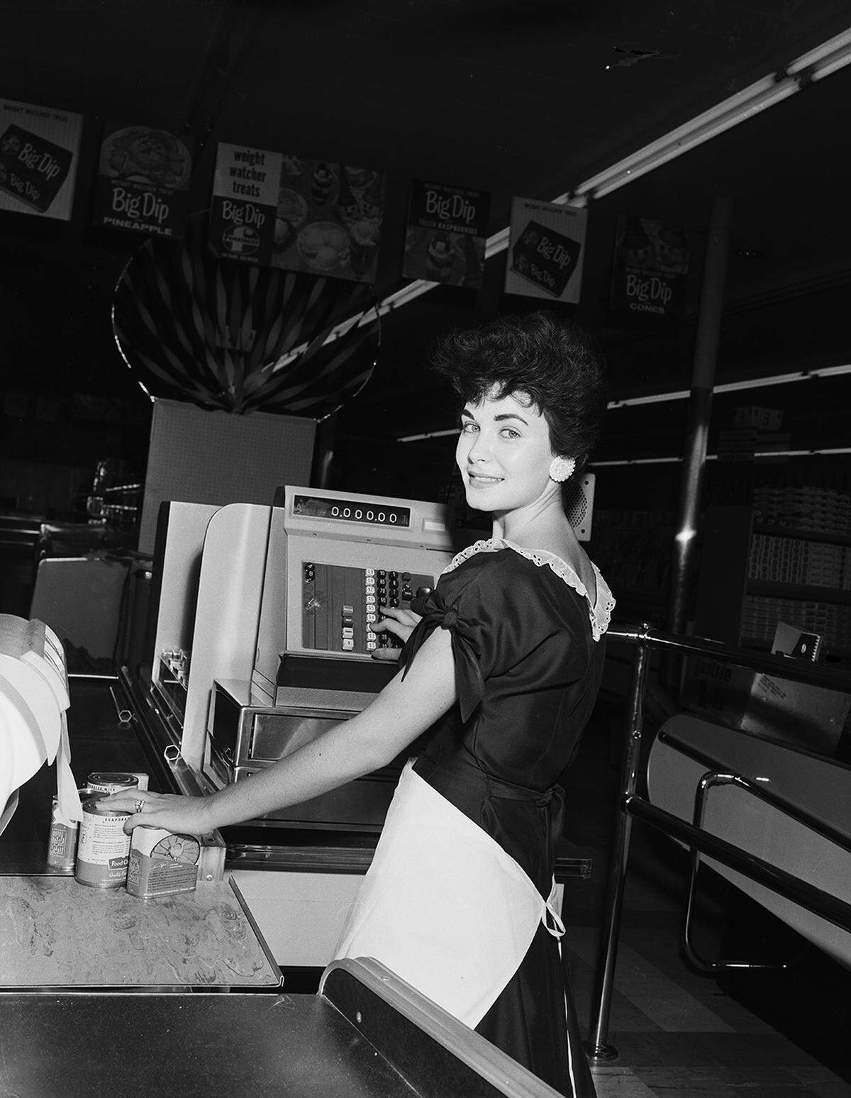 Sept. 15, 1958: Mrs. Mary Morrison shown at cash stand of Wrigley’s Super Market as the store was opening the new Town & Country Village shopping center at 2520 Jacksboro Highway, near Ephriham Avenue. The Star-Telegram reported that Wrigley’s “is one of the most modern stores in the Southwest, covering 25,500 square feet.” ”In addition to a full line of staple and fancy groceries and meats, the store will stock hardwares, toys, soft goods and wearing apparel, health and beauty aids, a full line of dairy products, frozen foods and party foods.”