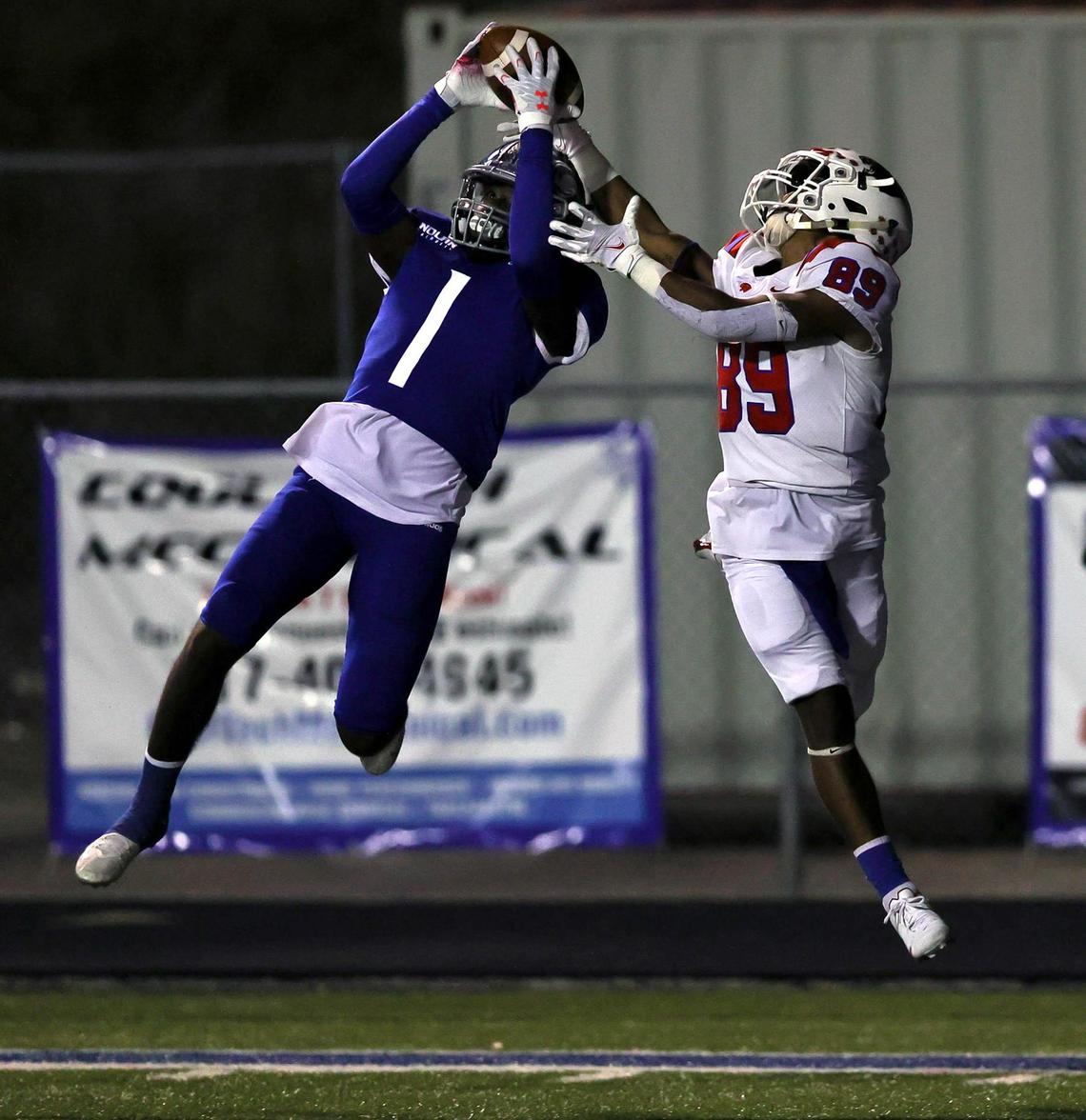 Nolan defensive back Keontae Williams (1) comes up with an interception in front of Parish Esiscopal receiver Jai Moore (89) during the first half of a high school football game, November 13, 2020 played at Doskocil Stadium in Fort Worth, Tx. (Steve Nurenberg Special to the Star-Telegram)